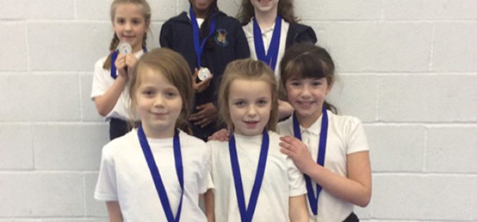 Gold and silver in gymnastics tournament